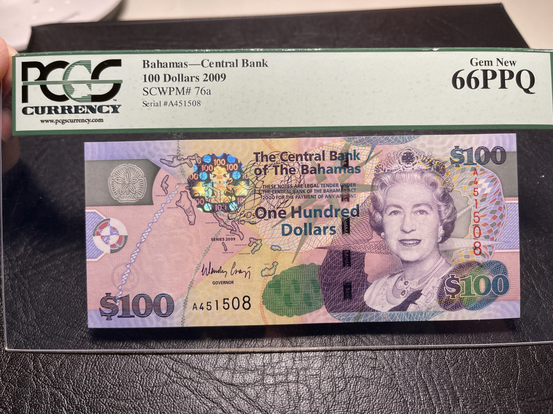 《外钞收藏家》第九十五期拍卖 2009年巴哈马100  pcgs66 A冠 