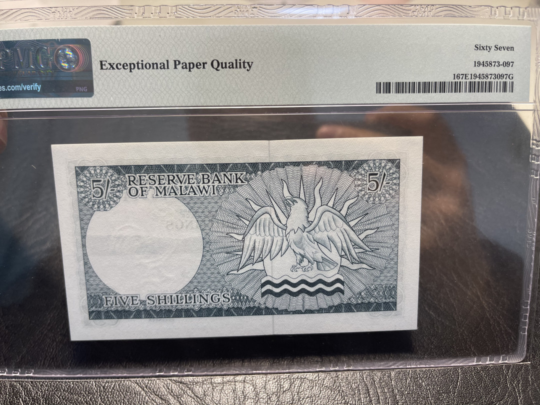 《外钞收藏家》第九十五期拍卖 1964年5先令 pmg67