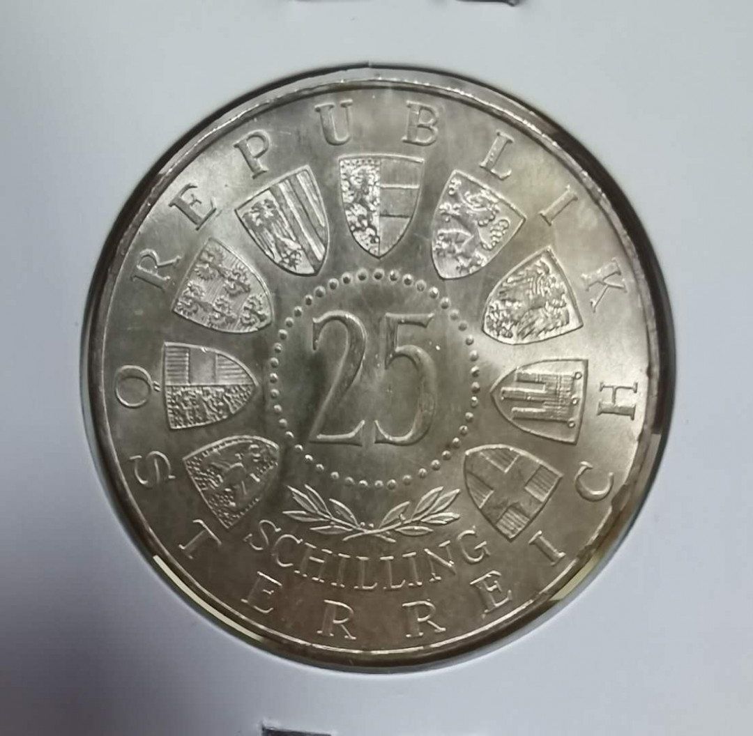 北京马甸外币专卖微拍第三十八期，金银币专场，陆续上新，欢迎光临  	1957年奥地利25先令纪念银币，重13克，成色：800，品相如图