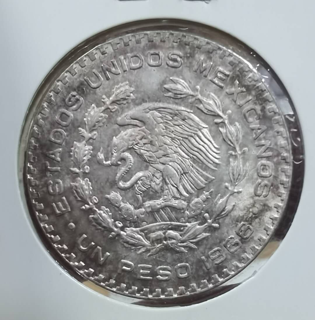 北京马甸外币专卖微拍第三十八期，金银币专场，陆续上新，欢迎光临 	1966年墨西哥银币，重16克，成色：1成银，品相如图