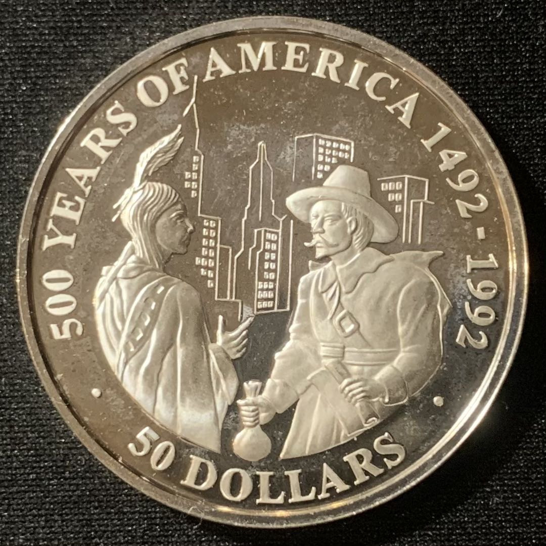 紫瑗钱币—微拍第128期  库克群岛 1991年 发现美洲500周年 皮特购买曼哈顿岛 50元 31.35克 0.925银 精制 