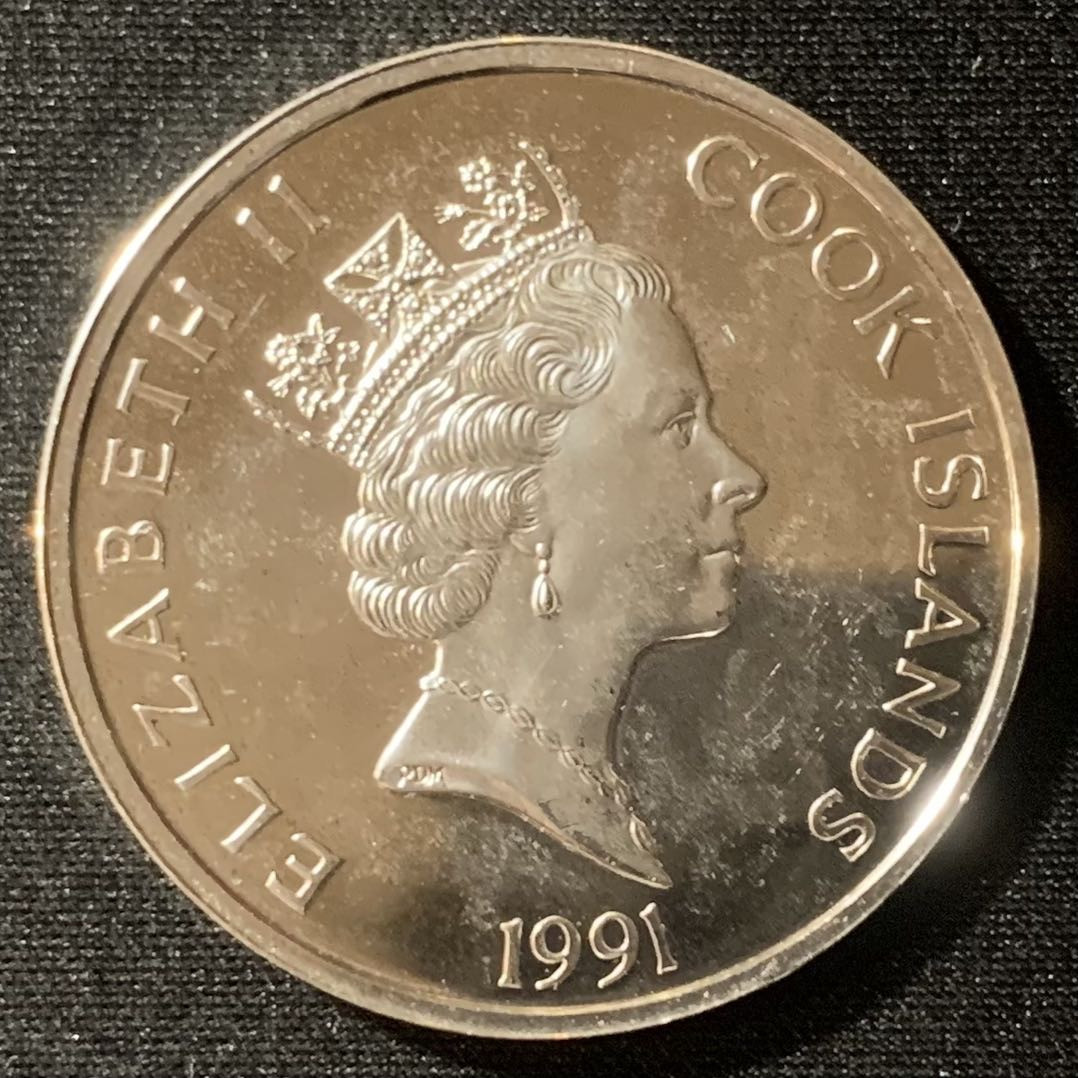 紫瑗钱币—微拍第128期  库克群岛 1991年 发现美洲500周年 皮特购买曼哈顿岛 50元 31.35克 0.925银 精制 