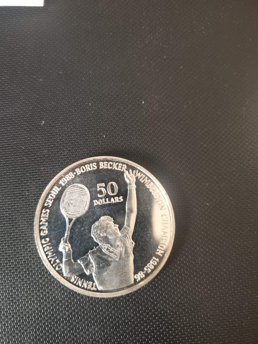 N&C第3期: 近现代外国银币专场 1987年纽埃50元大银币 网球运动员纪念币