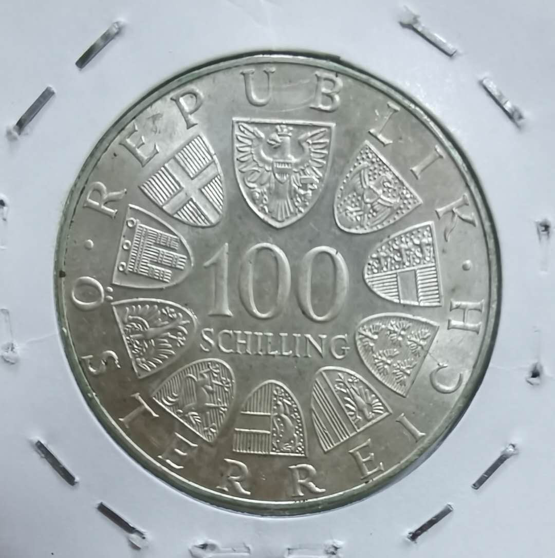 北京马甸外币专卖微拍第四十一期，金银币专场，陆续上新，欢迎关注 1976年奥地利100先令纪念银币，重量：24克，成色：640，品相如图
