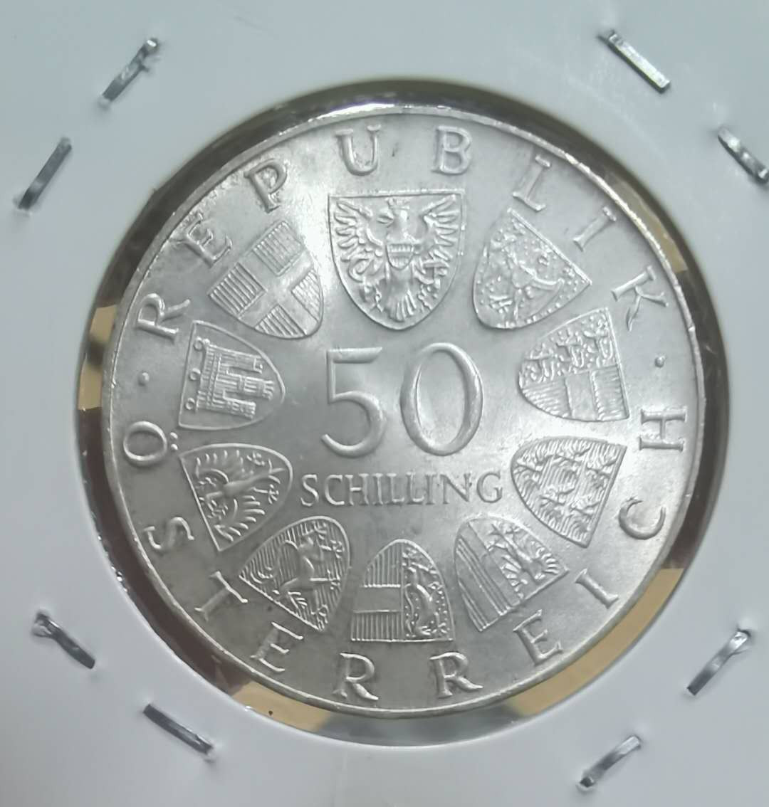 北京马甸外币专卖微拍第四十一期，金银币专场，陆续上新，欢迎关注  1973年奥地利50先令银币，重20克，成色900，品相如图 