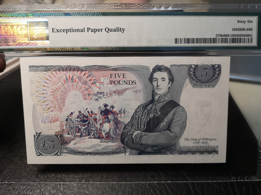 《外钞收藏家》二零二一新年拍（第100期） 378b  英国D序列5镑  PMG66