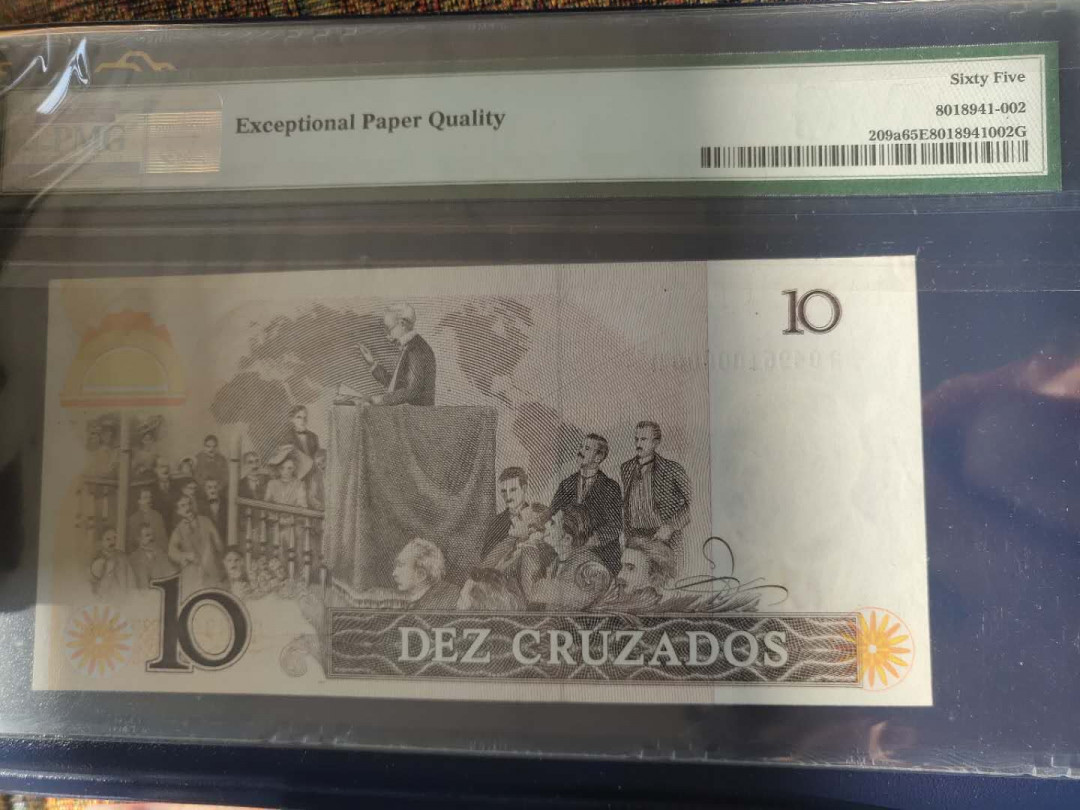 N&C第6期: 新春混合场 1986年巴西10靓号 PMG65E AA冠五个0