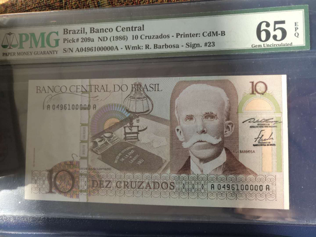 N&C第6期: 新春混合场 1986年巴西10靓号 PMG65E AA冠五个0