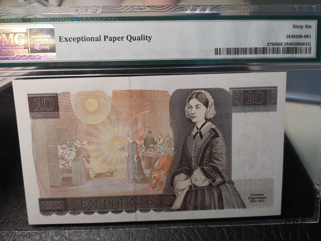 《外钞收藏家》二零二一新年拍（第100期） 379f  末签 英国D序列10镑  PMG66 稀少