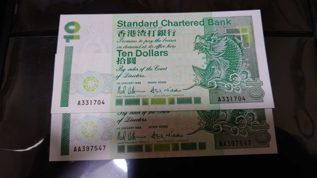 陆续更新【囧羊收藏】精选微拍第17期 ~2017年第八期 世界纸币精选（有澳门大金龙，天鹅船等） 1993年香港渣打银行10元 首发A冠+首发AA冠 共二张如图 全新绝品