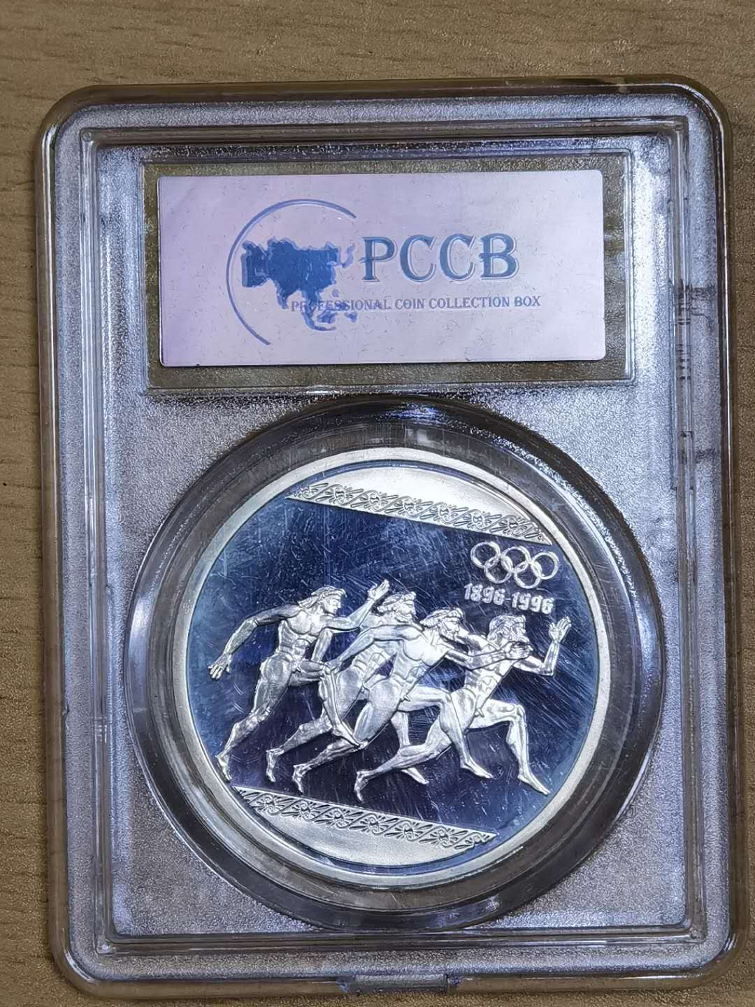 北京马甸外币专卖微拍第四十五期，外国金银币专场，陆续上新，欢迎关注 1996年希腊奥运百年纪念银币，重量：33.63克，成色：925。品相如图