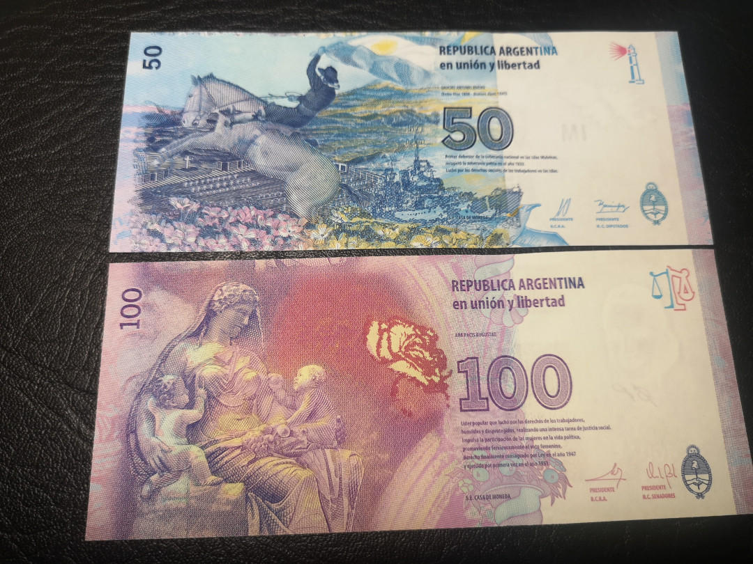 《外钞收藏家》第一百零三期拍卖 阿根廷100、50  两张精美小钞  全新unc