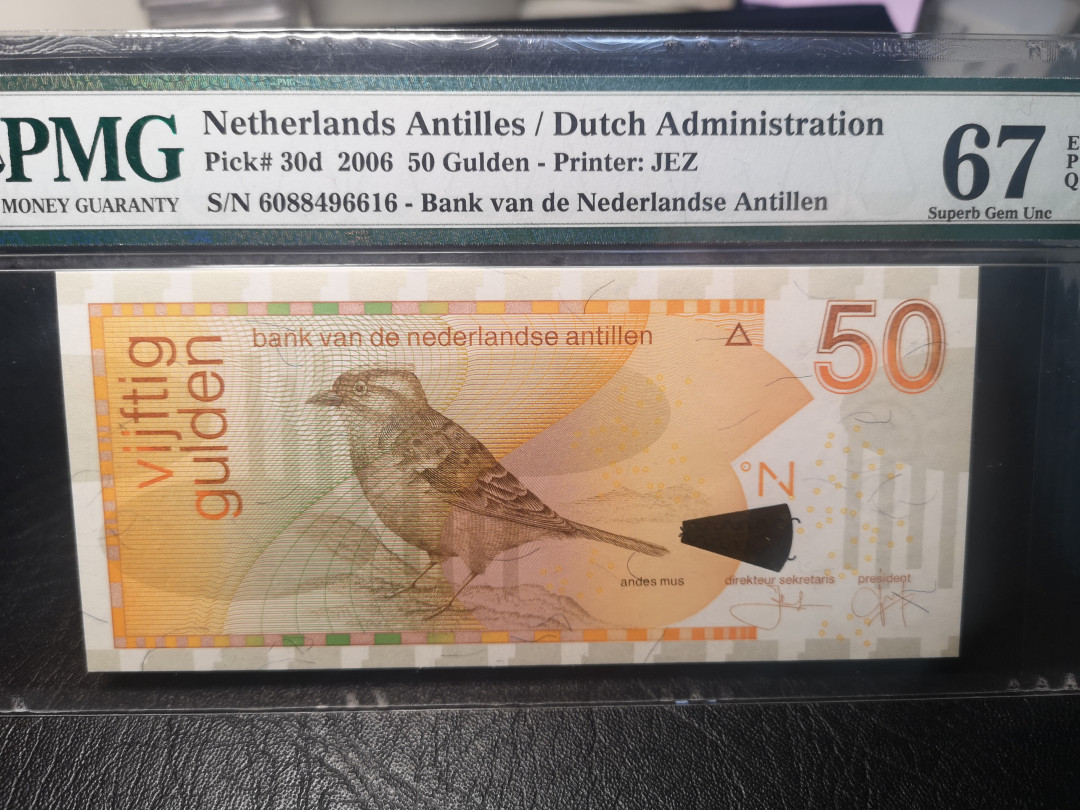 《外钞收藏家》第一百零三期拍卖 2006荷属安第列斯50  PMG67 JEZ作品