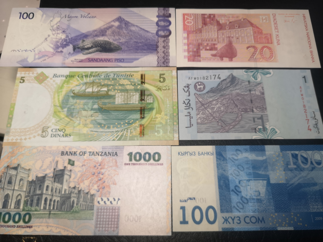 《外钞收藏家》第一百零三期拍卖 A多国精选六张精美小钞  全新unc