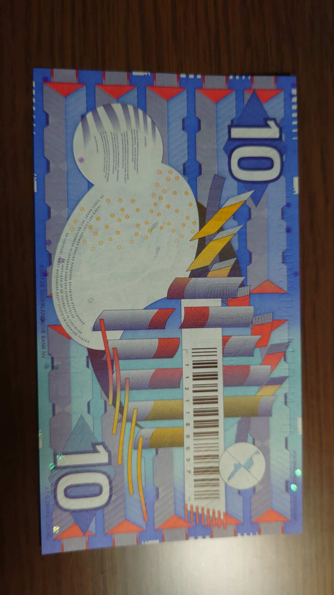 陆续更新【囧羊收藏】精选微拍第19期～2021年第十期   1997年荷兰10盾 齿轮版 全新刀拆绝品 尾7