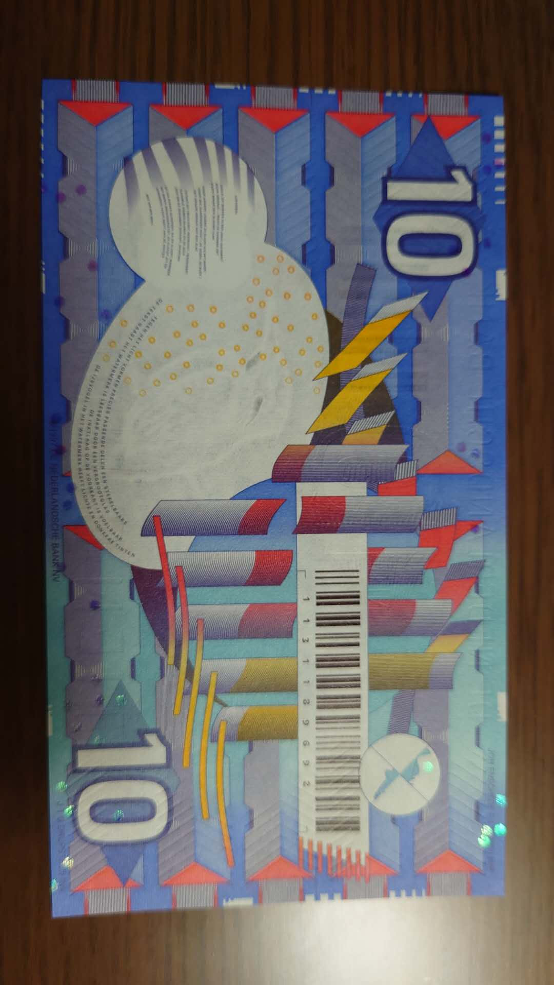 陆续更新【囧羊收藏】精选微拍第19期～2021年第十期   1997年荷兰10盾 齿轮版 全新刀拆绝品 全程无47尾92