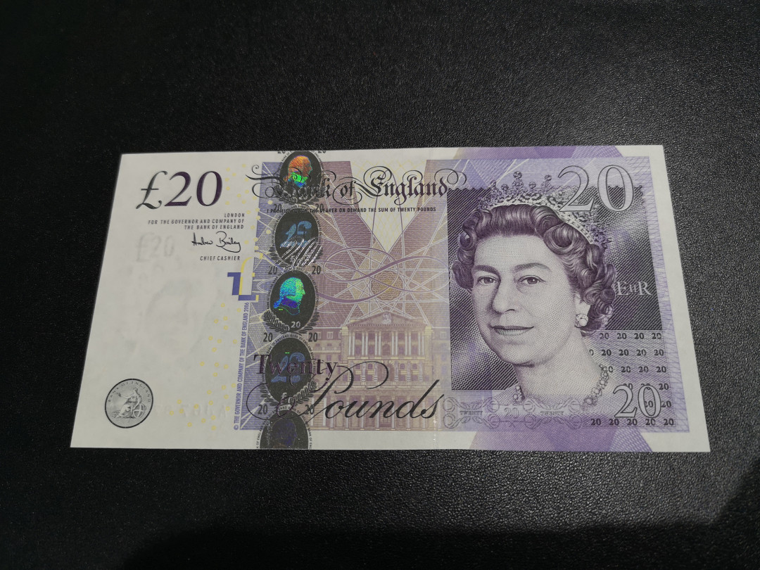 《外钞收藏家》第一百零五期拍卖 英国E序列20镑 全新UNC   821