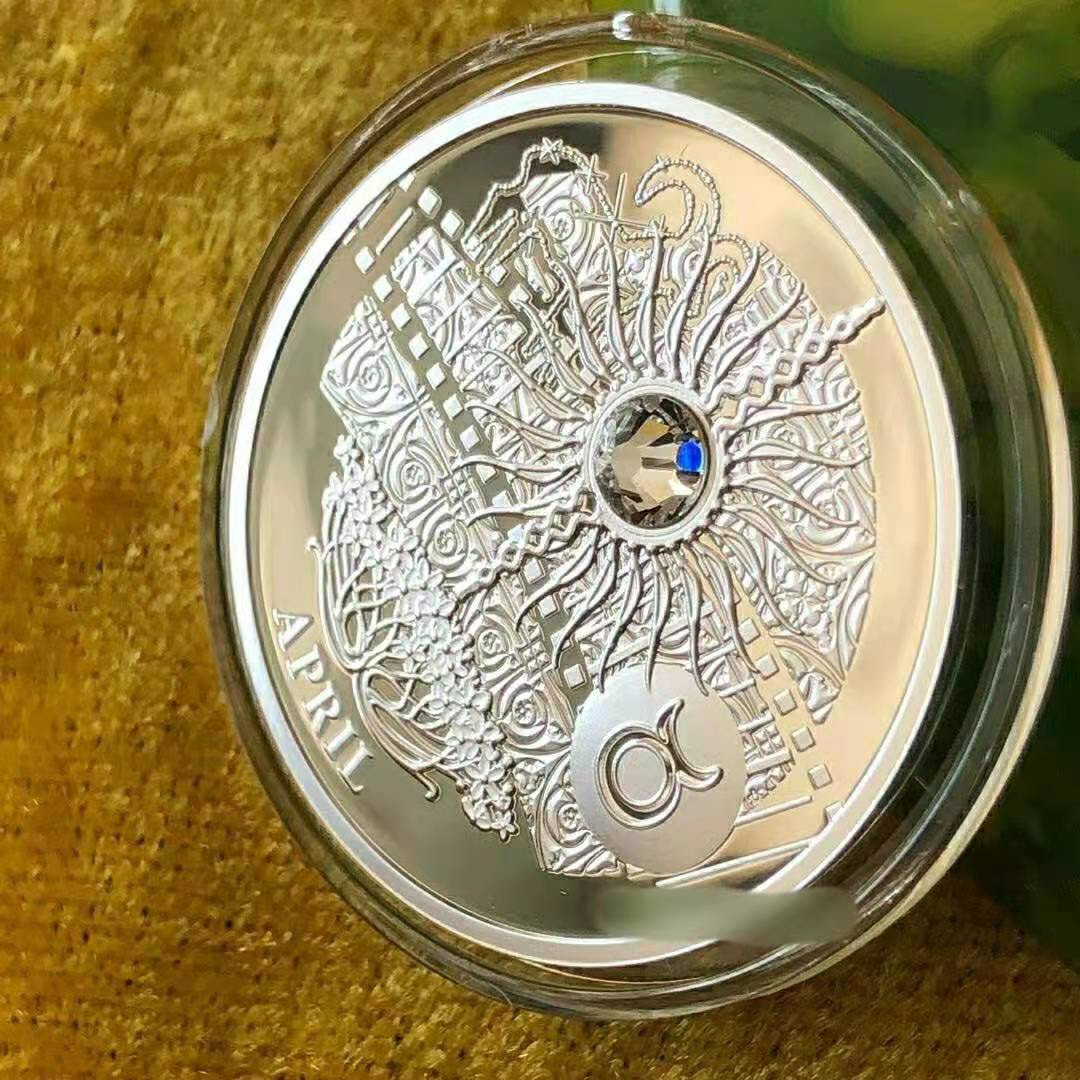 【币观天下】第142期钱币拍卖  纽埃2013年1元，“爱你一生(2013)”十二星座幸(性)福魔石系列(4)---四月“金牛座”，幸福魔石(透明宝石)，镶嵌施华洛世奇透明大宝石精制银币