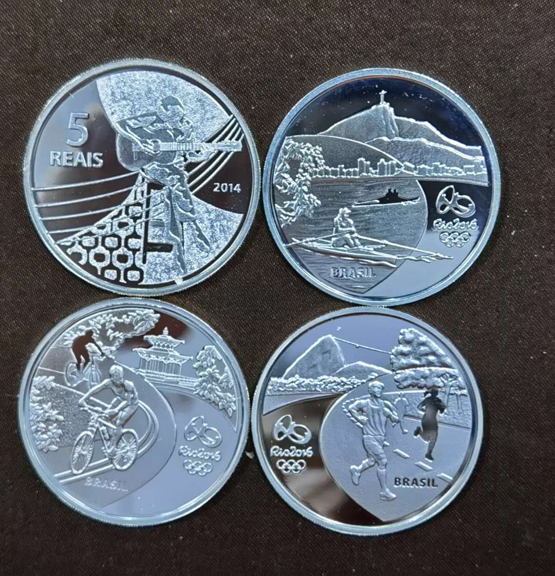 北京马甸外币专卖微拍第四十八场，外国金银币专场。陆续上新，欢迎关注。 2016年巴西里约奥运会银币第一组，每枚重量：27克，成色925，品相如图，盒证齐全