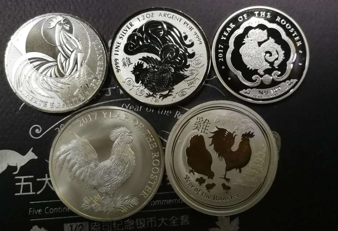 北京马甸外币专卖微拍第四十八场，外国金银币专场。陆续上新，欢迎关注。 2017年五大洲鸡年生肖1／2盎司银币5枚／套，分别为加拿大，澳大利亚，不丹，几内亚，法国，品相如图，礼品盒包装，盒证齐全