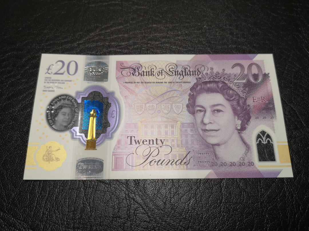 《外钞收藏家》第一百零七期拍卖 英国最新版塑料钞 20镑 222豹子号 全新UNC