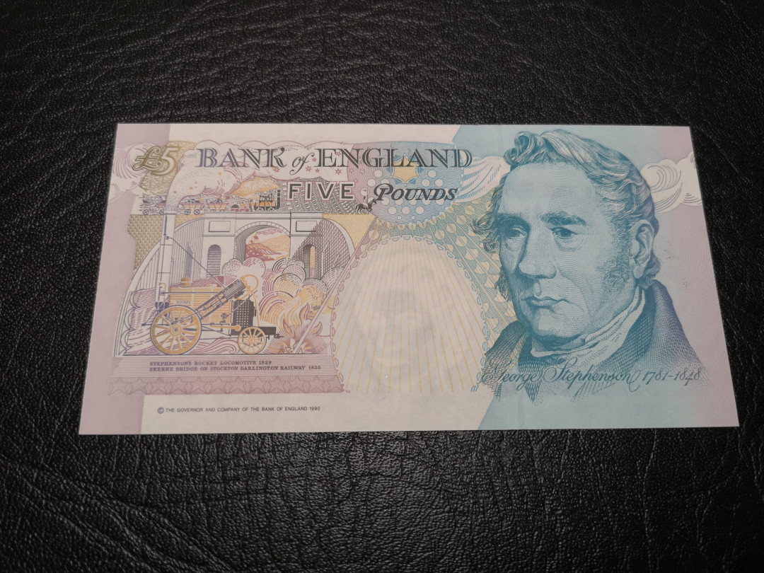 《外钞收藏家》第一百零七期拍卖 英国E序列5镑 全新UNC