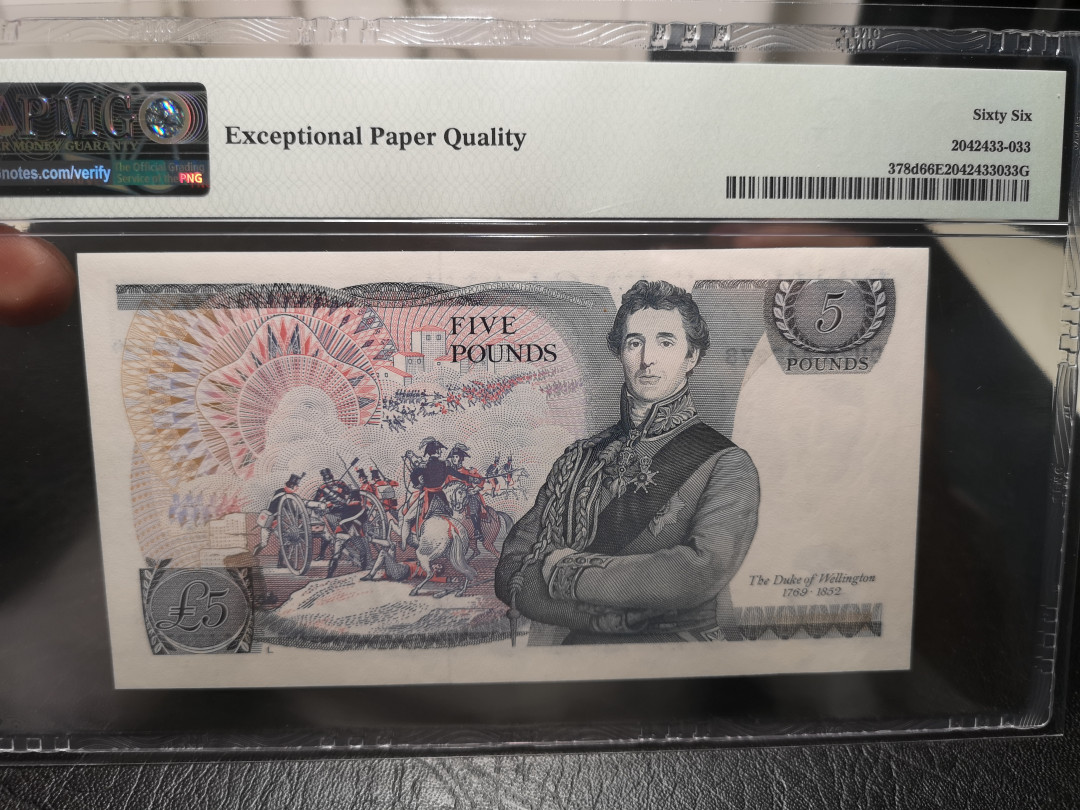 《外钞收藏家》第一百零七期拍卖 英国D序列5镑 无签名版 PMG66 稀少
