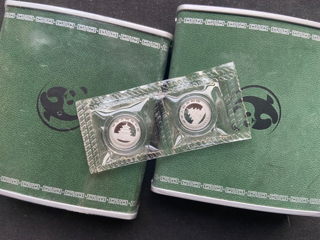 【币观天下】第144场拍卖 2003年中国铂金小熊猫2枚