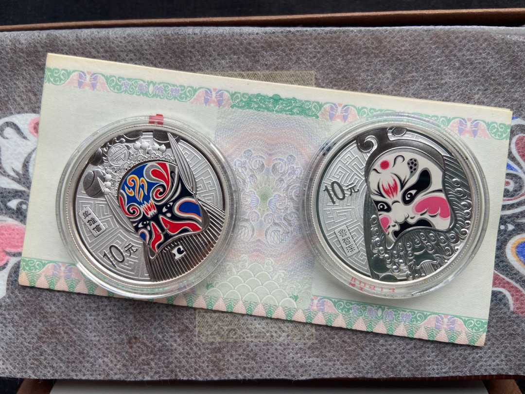 【币观天下】第144场拍卖 中国2011年京剧脸谱银币套装2枚～