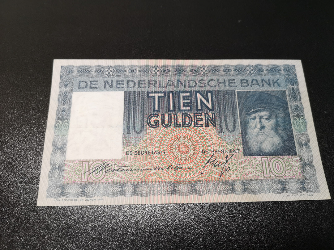 《外钞收藏家》第一百零八期拍卖 1935年荷兰10盾 7品左右 参考图片