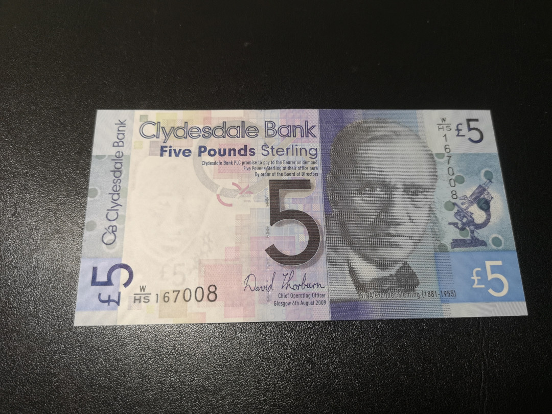 《外钞收藏家》第一百零八期拍卖 2009年苏格兰克莱斯戴尔银行5镑 首发冠 号码很不错 全新UNC