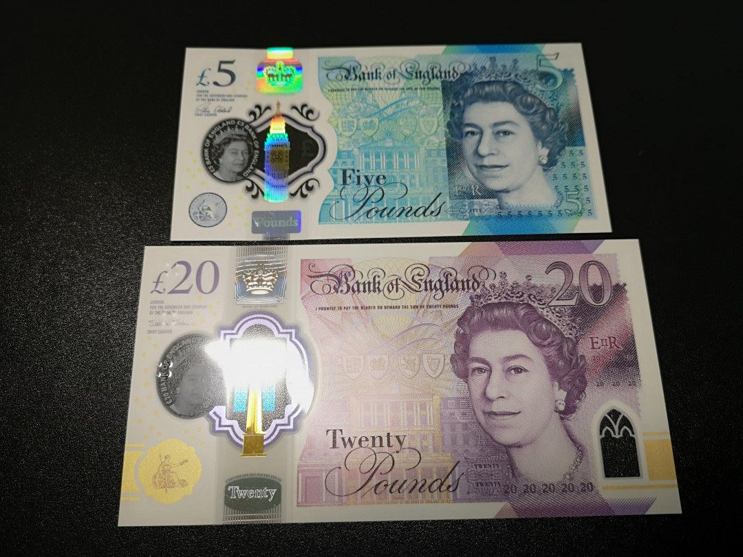 《外钞收藏家》第一百零八期拍卖 英国最新版塑料钞20、5镑两张 全新UNC