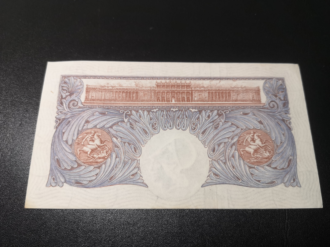 《外钞收藏家》第一百零八期拍卖 英国A序列1镑 8品左右 年代久 详细品相参考图片