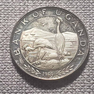 0起1加-纯粹捡漏拍-21场 - 乌干达1969年5先令教皇访问精制纪念银币-小钱包装
