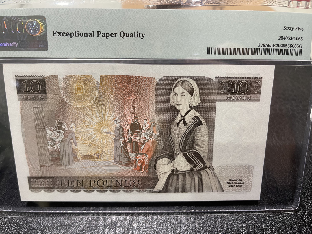 《外钞收藏家》第一百零九期拍卖 1975-80年D序列10镑 PMG65 A冠 双雕版 号码不错