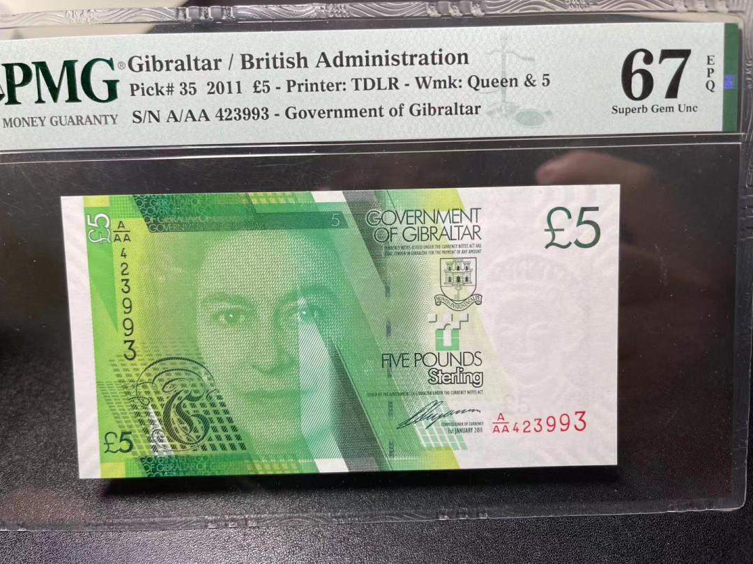 《外钞收藏家》第一百零九期拍卖 2011 年直布罗陀5镑 AAA冠 PMG67