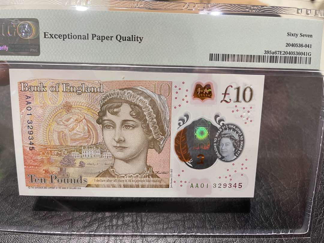 《外钞收藏家》第一百零九期拍卖 2016年英国10镑 PMG67 AA01首发冠