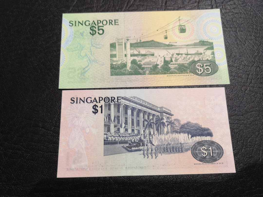 《外钞收藏家》第一百一十期拍卖 新加坡鸟版5、1元两张 全新UNC BWC印钞