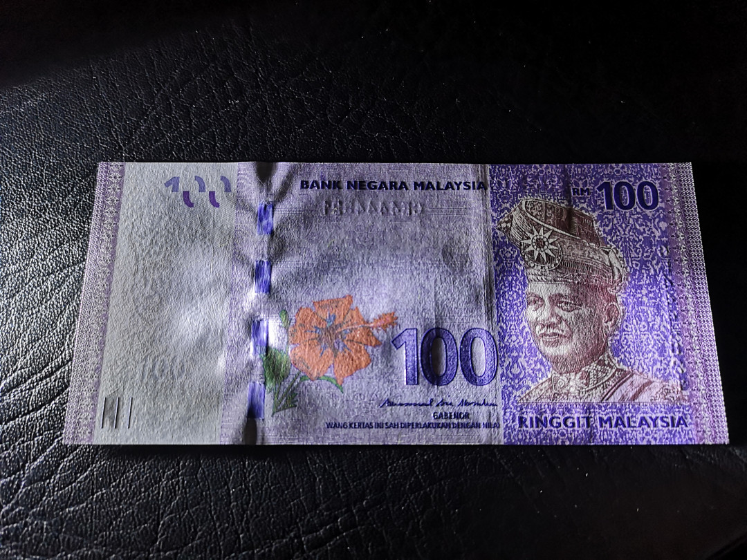 《外钞收藏家》第一百一十期拍卖 马来西亚100流通钞 4444狮子头 全新UNC