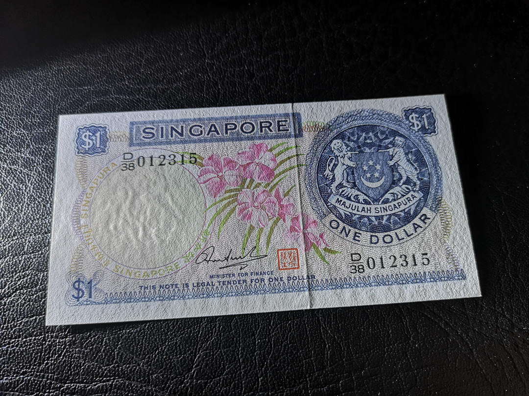 《外钞收藏家》第一百一十期拍卖 新加坡花版1元 全新UNC BWC印钞