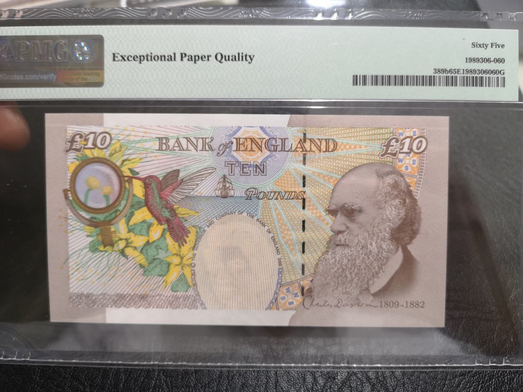 《外钞收藏家》第一百一十期拍卖 2000年英国E序列10镑 PMG65 389b非常少见 AA01首发冠
