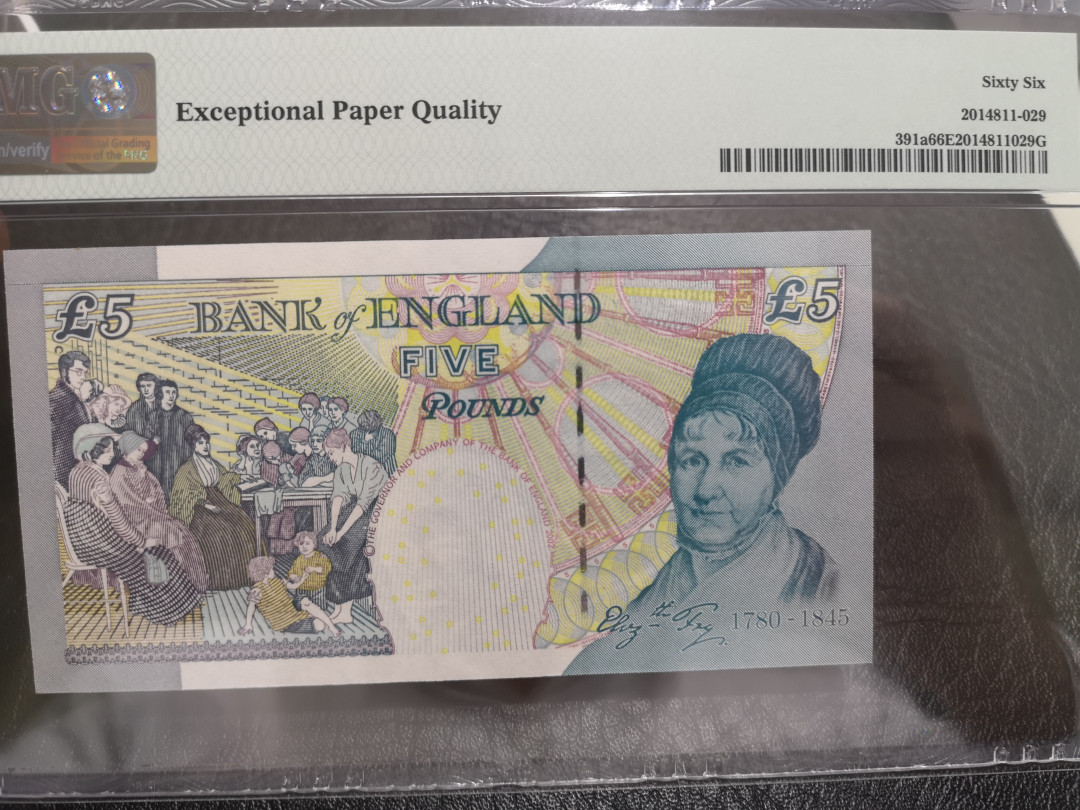 《外钞收藏家》第一百一十期拍卖 2002年英国E序列5镑 PMG66 首发冠 千位号