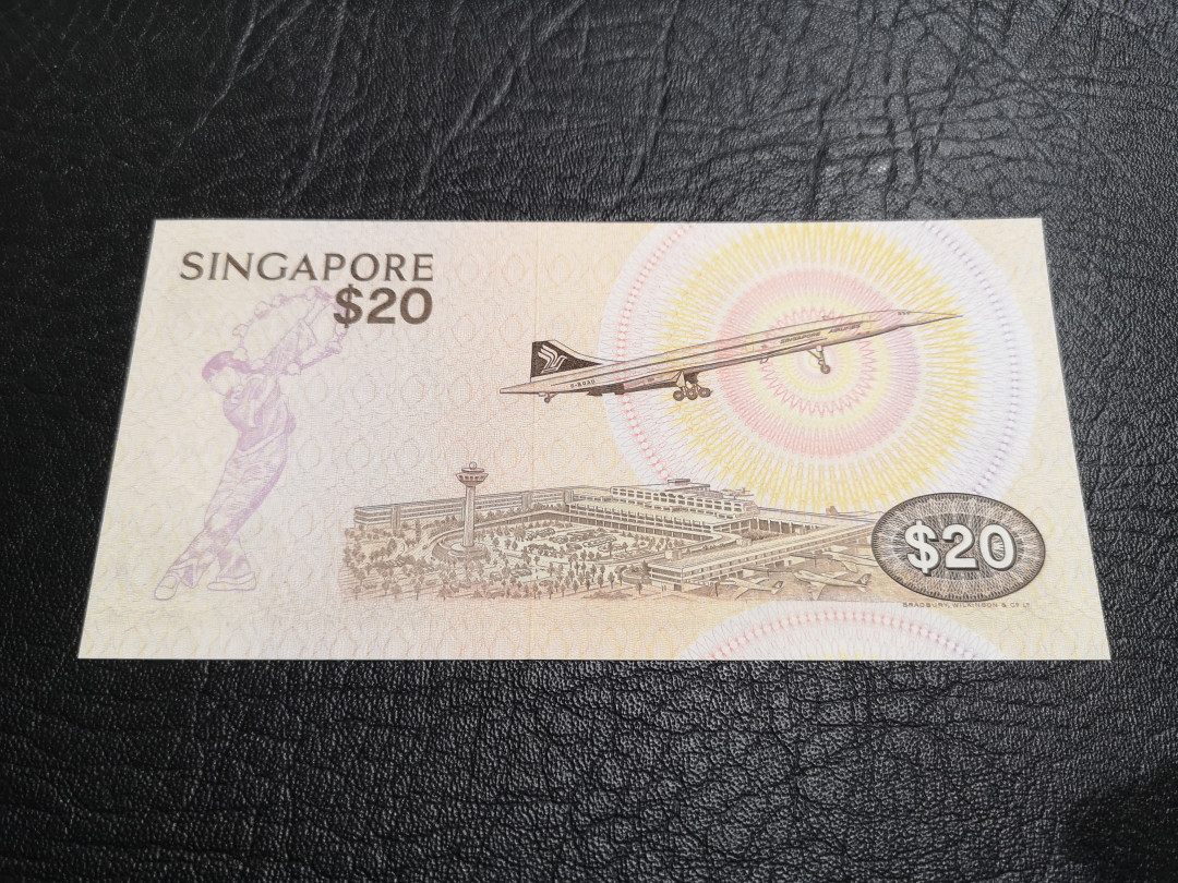 《外钞收藏家》第一百一十期拍卖 新加坡鸟版20元 全新UNC BWC印钞