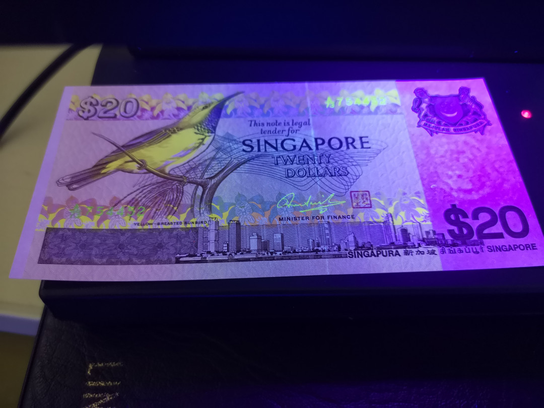 《外钞收藏家》第一百一十期拍卖 新加坡鸟版20元 全新UNC BWC印钞