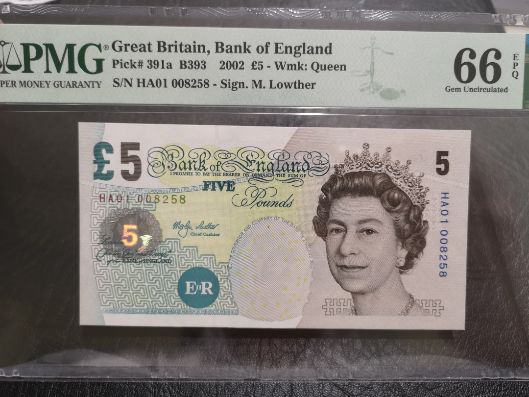 《外钞收藏家》第一百一十期拍卖 2002年英国E序列5镑 PMG66 首发冠 千位号