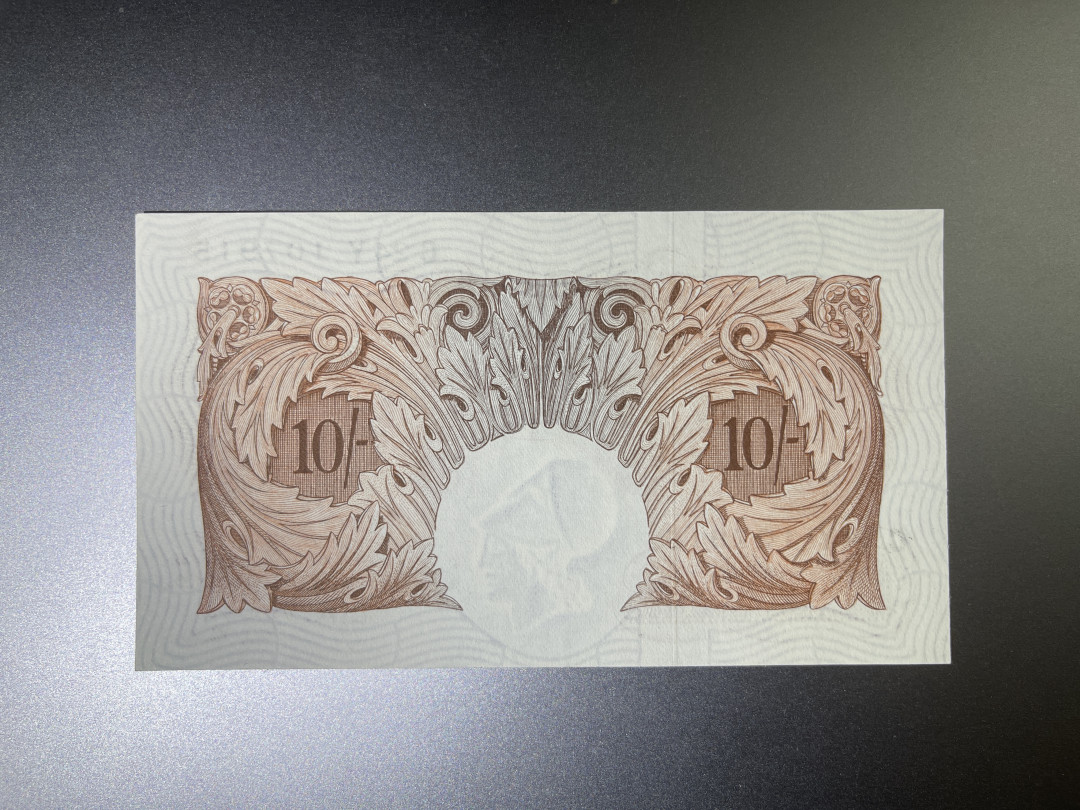 《张总收藏》25期—PMG67 A序列英镑 10先令 1955年 UNC-