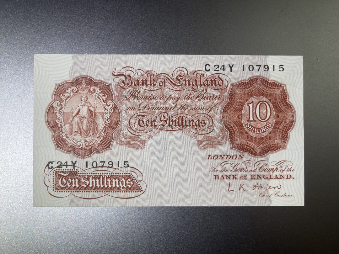 《张总收藏》25期—PMG67 A序列英镑 10先令 1955年 UNC-