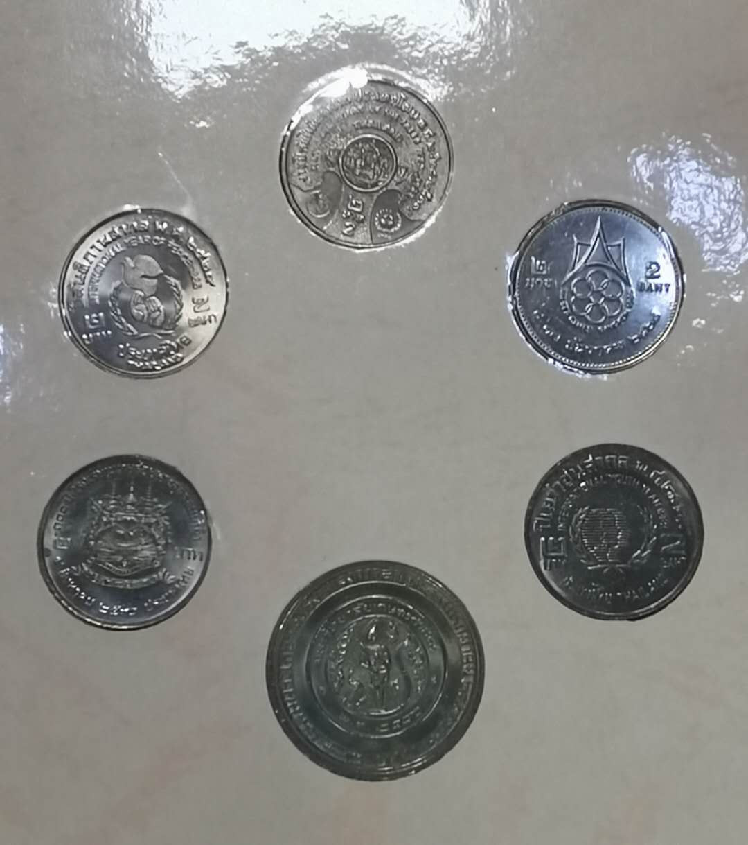 北京马甸外币专卖微拍第五十一期，外国流通币，非贵金属纪念币专场，陆续上新欢迎关注 泰国官方纪念币册12枚
