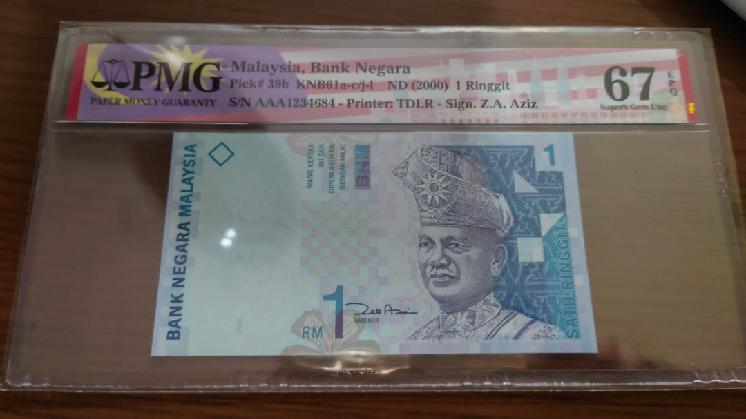 今晚八点整~【囧羊收藏】精选微拍第27期暨2021年第十八期 港澳及外币精选 【已售出，预出价】2000年马来西亚1林吉特 首发AAA冠稀少 全新绝品PMG67E 尾号684