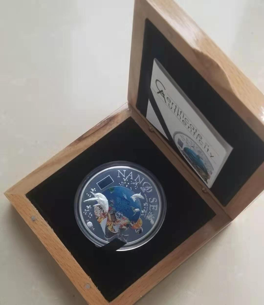 【币观天下】第150期钱币拍卖 库克2014年海底世界纳米芯片镶嵌银币 